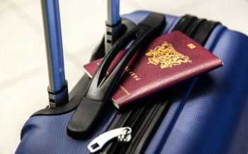 Vakantie - koffer - paspoort